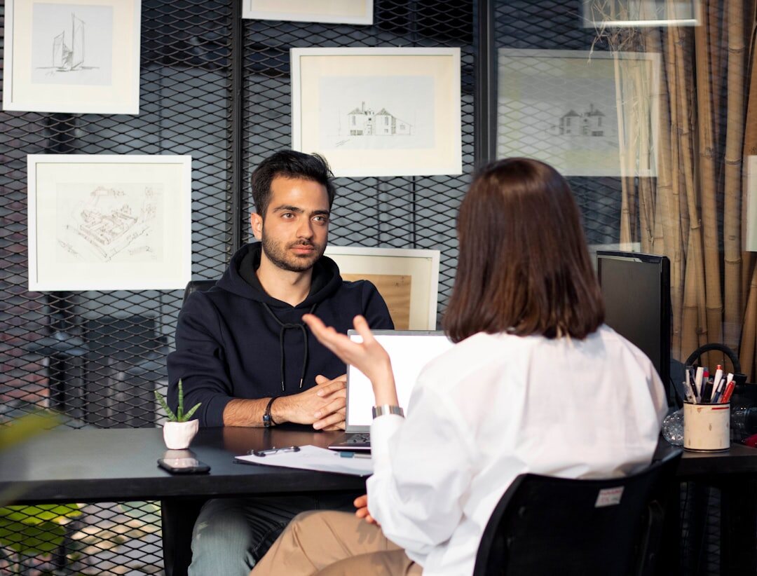 Interview training session with two people talking