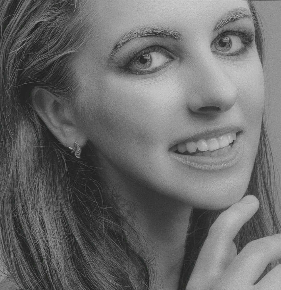 Smiling female communication trainer with professional look