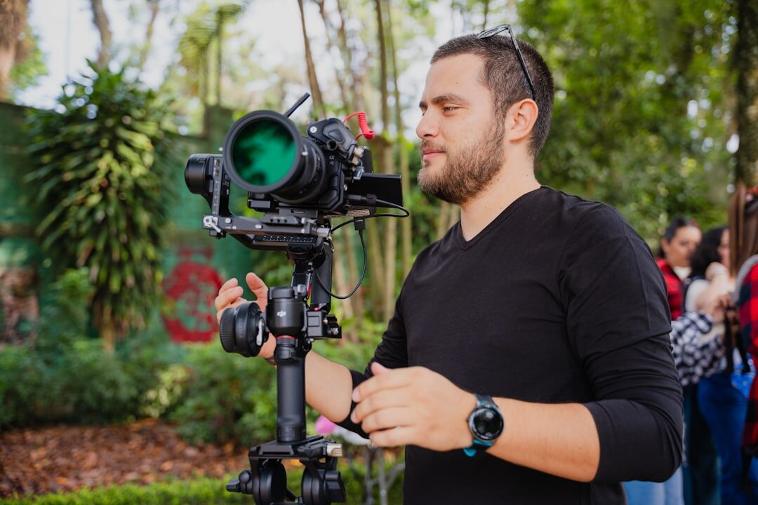 Journalist with microphone interviewing expert outdoors