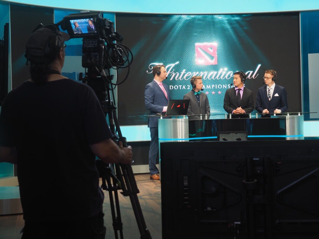 Professional video camera on tripod in broadcast studio